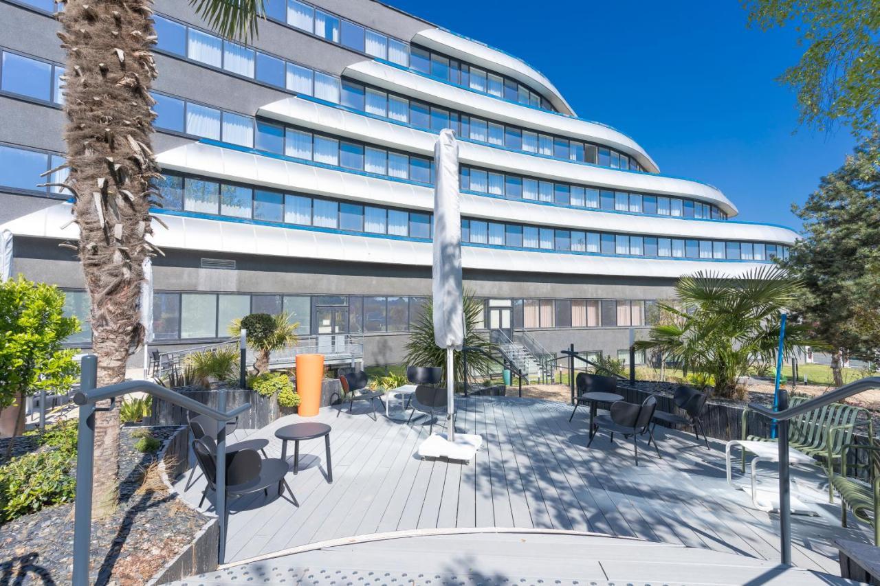 Novotel Poitiers Site Du Futuroscope Шасней дю Пуату Екстериор снимка